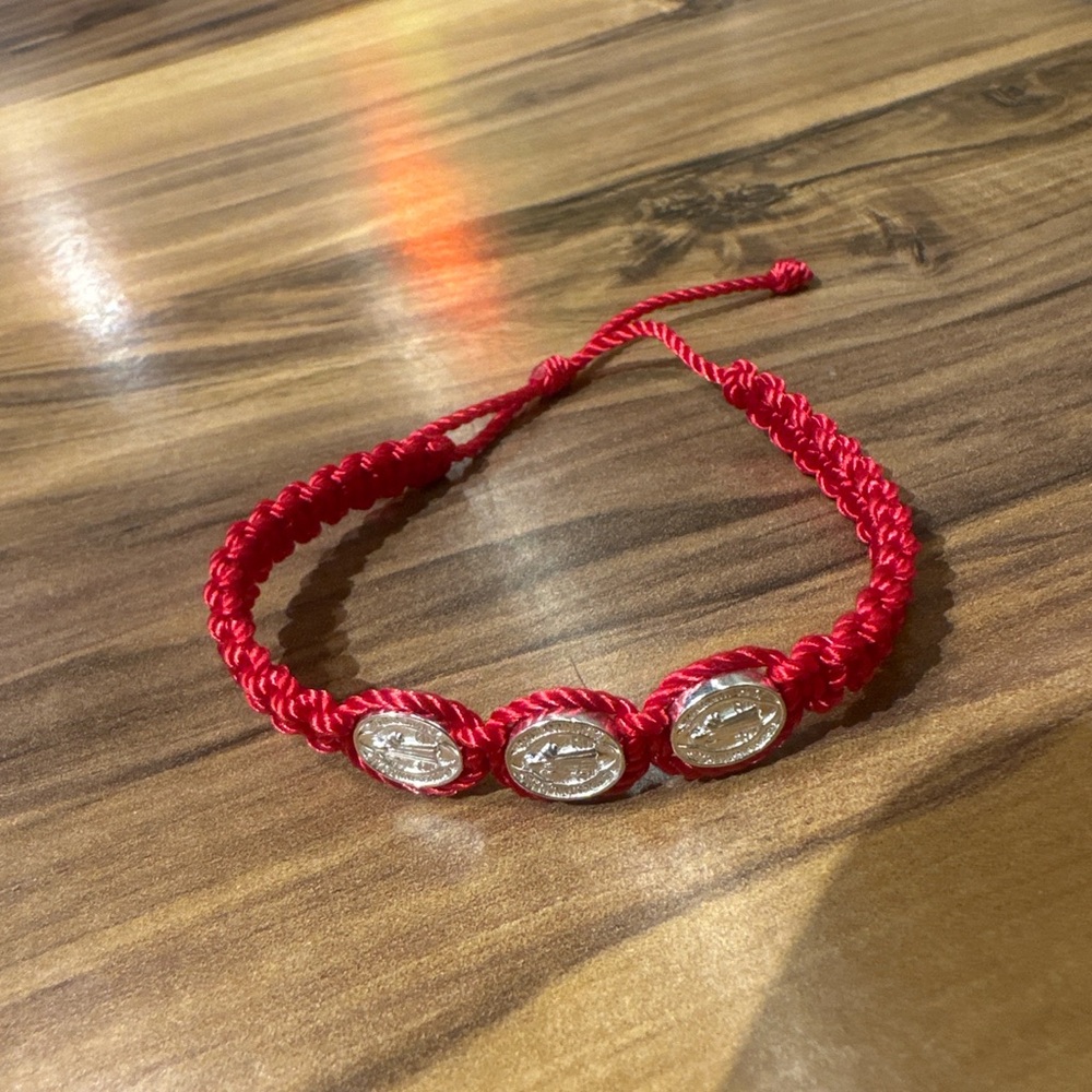 Handmade Saint Benedict red  bracelet featuring three San Benito  medals. Adjust